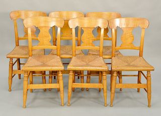 Set of six Sheraton tiger maple side chairs with rush seats, circa 1840.