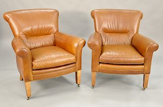 Pair of Lee Industries leather upholstered club chairs. ht. 36 in., wd. 34 in. Provenance: From the Estate of Deborah G. Black of Gr...