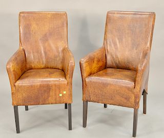 Pair of leather or vinyl armchairs. ht. 40 1/2 in., wd. 23 in.