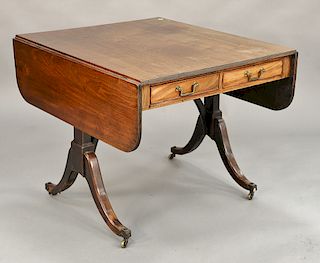 George III mahogany drop leaf table having two drawers on either side set on four downswept members, circa 1820. ht. 27 1/2 in., top...