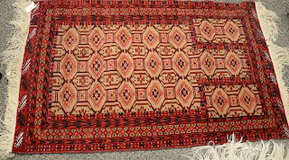 Five Oriental rugs including a Hamaden Oriental runner. (2'4" x 8'5"), (3'10" x 6'2"), (2'10" x 4'3"), (4'6" x 5'3"), and (1'9" x 1'...