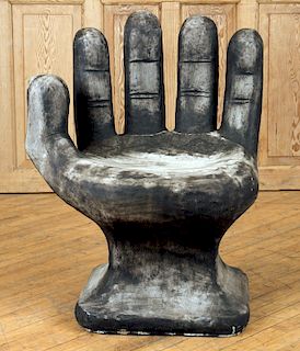 LARGE CAST IRON GARDEN SEAT IN FORM OF HUMAN HAND