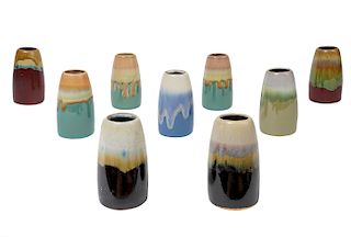 Grouping of 9 Glazed C.P.N.P Pottery Vases