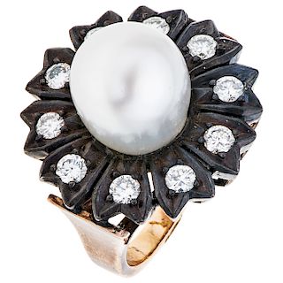 A cultured pearl and diamond 18K rose gold and silver ring.