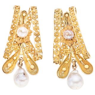 A cultured pearl 18K yellow gold pair of earrings.