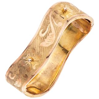 An 8K yellow gold bangle bracelet.