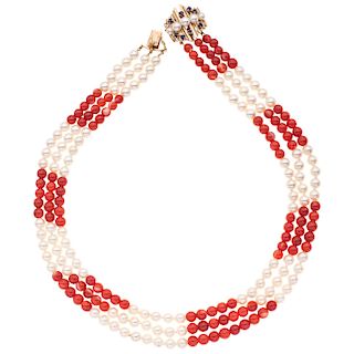 A coral and cultured pearl necklace with a pearl and sapphire 14K yellow gold clasp.
