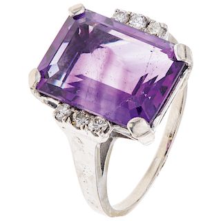 An amethyst and diamond 14K white gold ring.