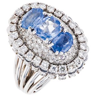 A sapphire and diamond platinum ring.