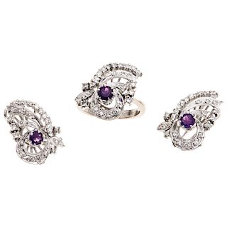 An amethyst and diamond palladium silver ring and pair of earrings set.