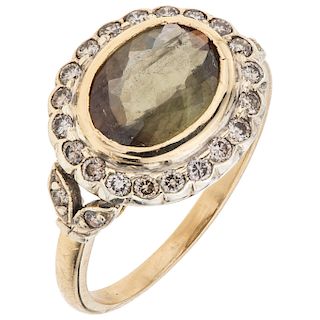 An andalusite and diamond 18K yellow gold ring.