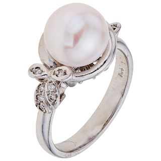 A cultured pearl and diamond 14K white gold ring.