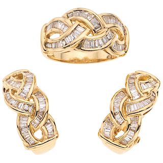 A diamond 14K yellow gold ring and pair of earrings set.