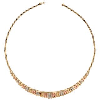 A 14K yellow, white and rose gold necklace.
