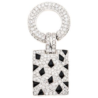 An obsidian and diamond 18K white gold pendant.