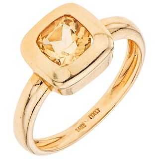 A citrine 14K yellow gold ring.