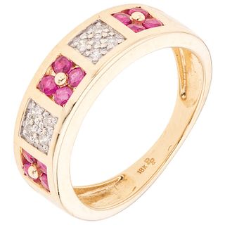 A ruby and diamond 18K yellow gold ring.