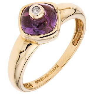 An amethyst and diamond 14K yellow gold ring.