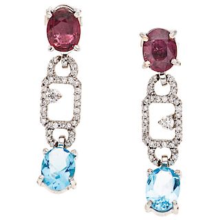 A tourmaline, topaz and diamond 18K yellow gold pair of earrings.