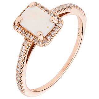 An opal and diamond 14K rose gold ring.