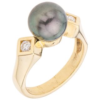 A cultured pearl and diamond 18K white gold ring.
