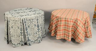 Two tables with custom upholstered table cloths, one in shape of octogon (ht. 30 in., dia. 43 in.) and the other is circular (ht. 29 1/2 in., dia. 42 