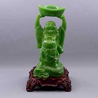 Buda-Hotei sonriente. Origen oriental. Siglo XX. Elaborado en resina. Con base de color vino decorada con elementos orgánicos.