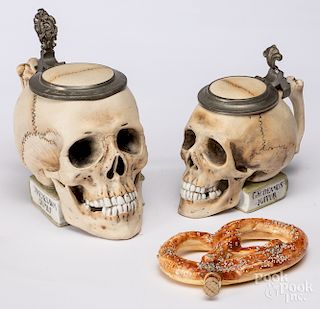 Two bisque porcelain skull steins, etc.