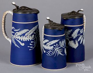 Three Wedgwood pitchers