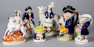 Six Staffordshire figurines and toby pitchers