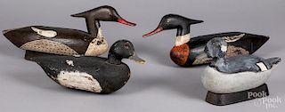 Four carved and painted duck decoys.