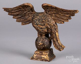 Carved and gilded eagle finial