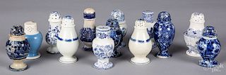 Thirteen Staffordshire and pearlware pepper pots