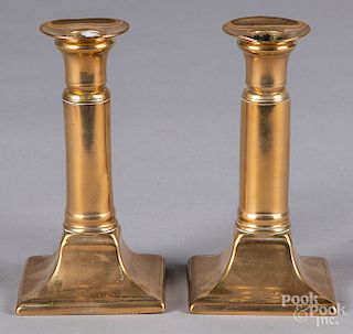 Pair of brass telescoping candlesticks