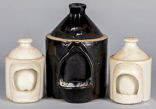 Three stoneware feeders