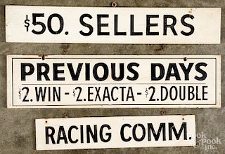 Three horse racing painted wood signs