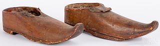 Large pair of carved wooden shoes