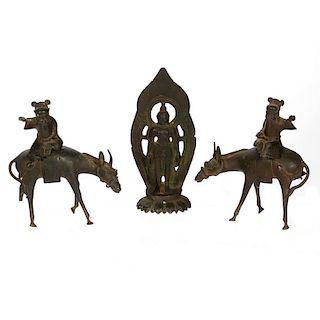 Two Chinese cast bronze horsemen and a Buddha.