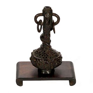 An 18th century Chinese cast bronze vase on stand.