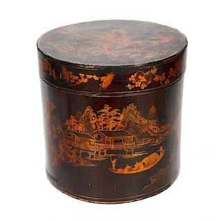 A large cylindrical Chinese lacquer box.