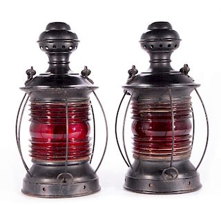 A pair of railroad lanterns.