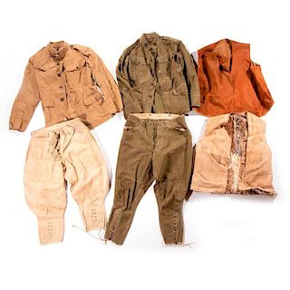 Two WWI military vests and two WWI military tunics and two pair pants.three being US Balloon Corps.