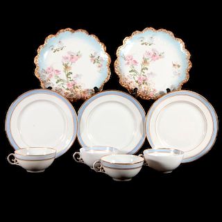A Royal Copenhagen tea set and twelve French cake plates.