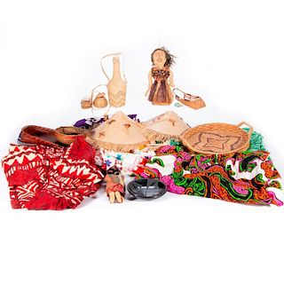 A collection of ethnic fabrics, straw work etc. including a San Ildefonso piece.
