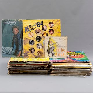 Colección de discos. LaserDisc y LP's. Diferentes películas y géneros musicales. Consta de 66 piezas aproximadamente.