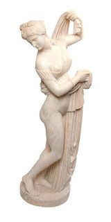 * A Continental Carved Marble Figure Height 31 inches.