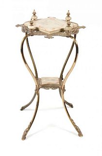* A Victorian and Gilt Metal Mounted Onyx Table Height 32 inches.