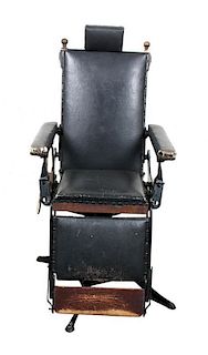 * A Victorian Oak and Wrought Iron Barber Chair, McDonald Height 59 x width 26 x depth 35 inches.