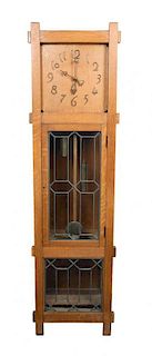 An Arts and Crafts Tall Case Clock Height 74 3/4 inches.