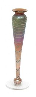 * An Iridescent Art Glass Bud Vase Height 9 7/8 inches.